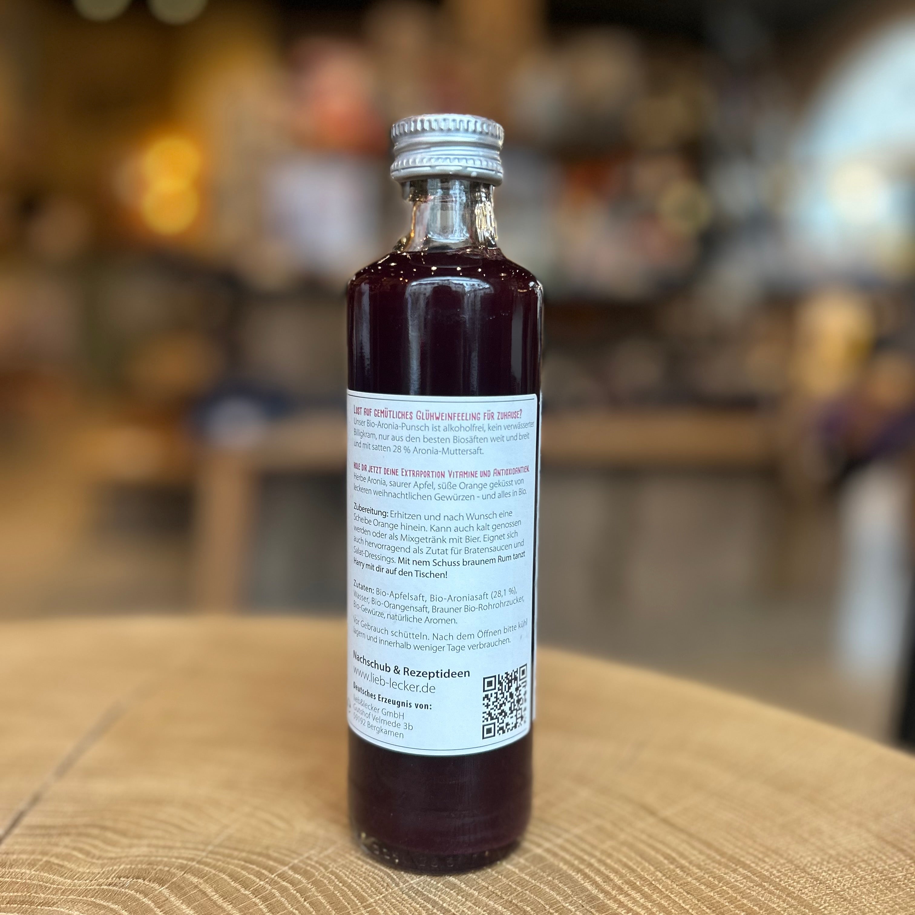 Kleine 0,25-l-Flasche „Heißer Harry“ Bio-Aronia-Punsch von Lieb & Lecker. Alkoholfreier Winterpunsch für zuhause, ideal für Kinder und Erwachsene.