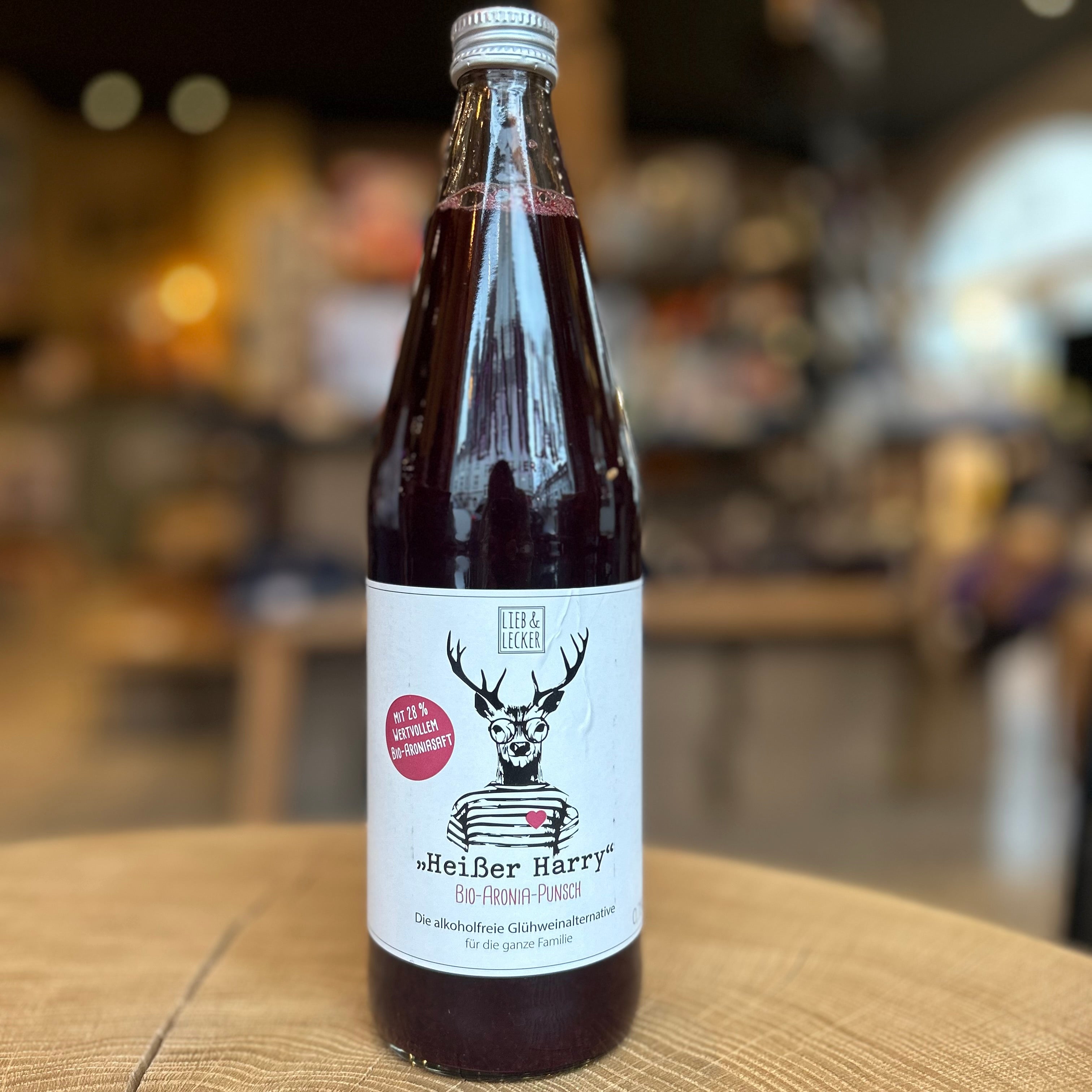 Große 0,75-l-Flasche „Heißer Harry“ Bio-Aronia-Punsch von Lieb & Lecker. Alkoholfreie Glühwein-Alternative mit Aronia, perfekt für die Winterzeit und die ganze Familie.
